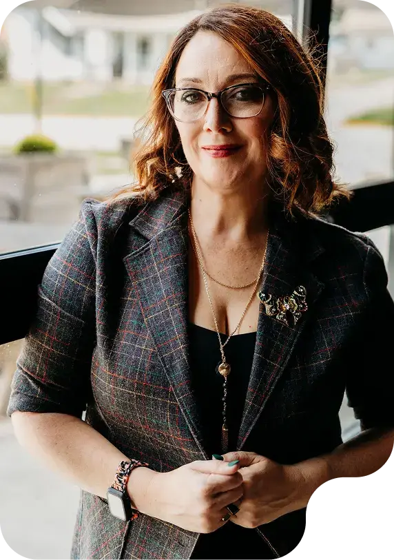Amy founder of Ivy Insights standing in professional office